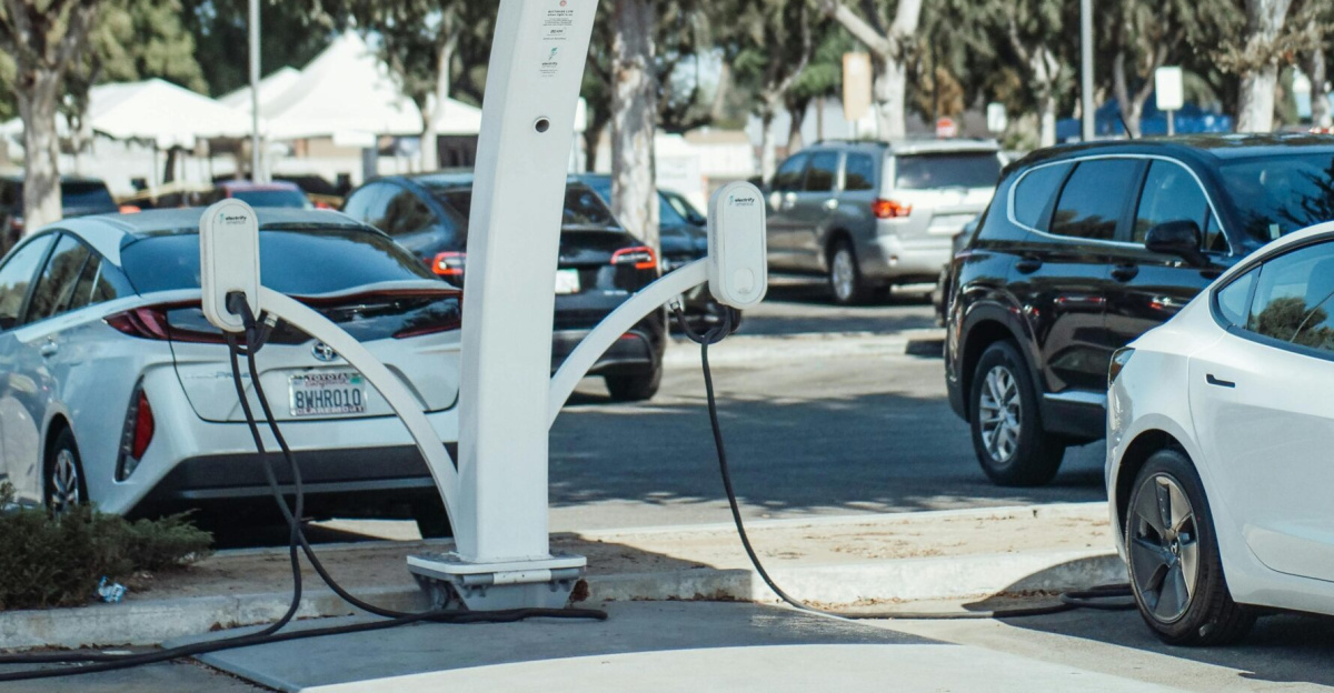 Eco-friendly solar panel charging station for electric vehicles outdoors.