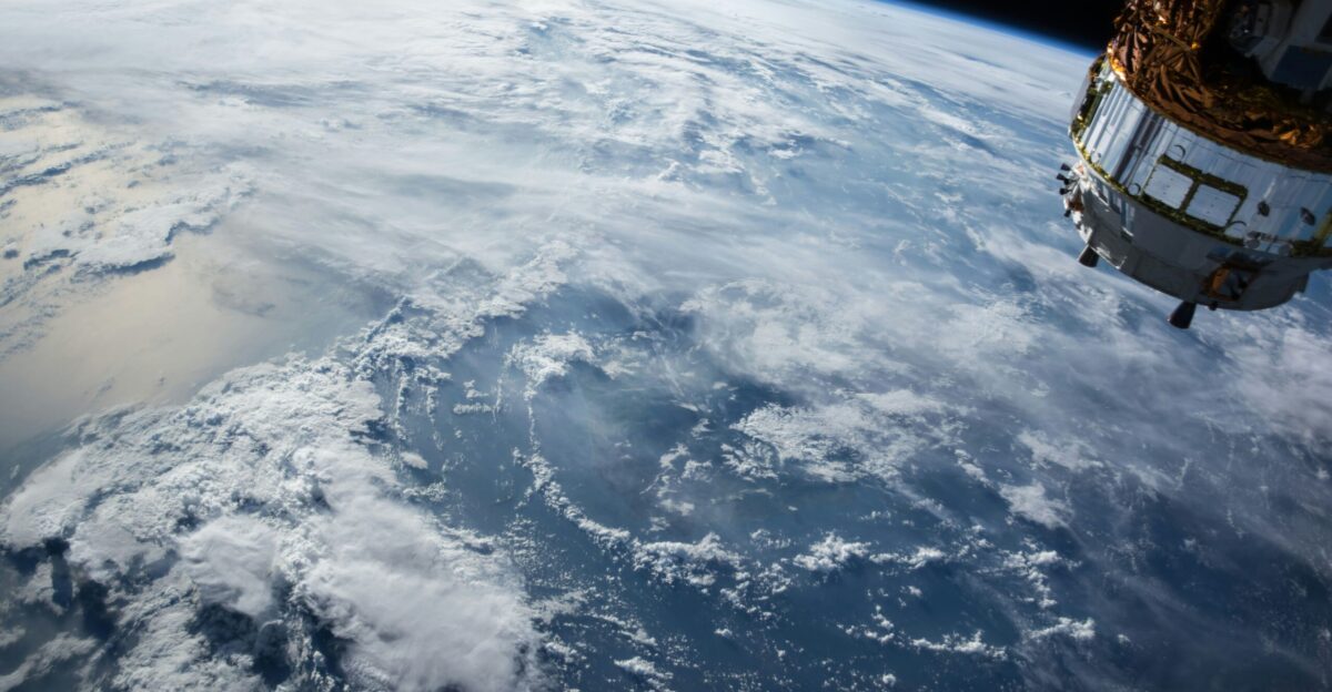 view of Earth and satellite