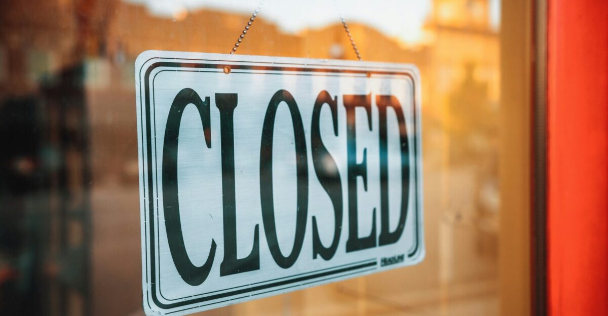 selective focus photography of Closed signage