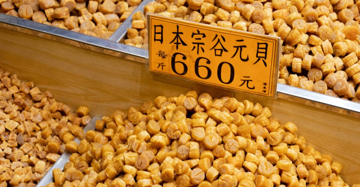 brown and beige nuts on white wooden shelf