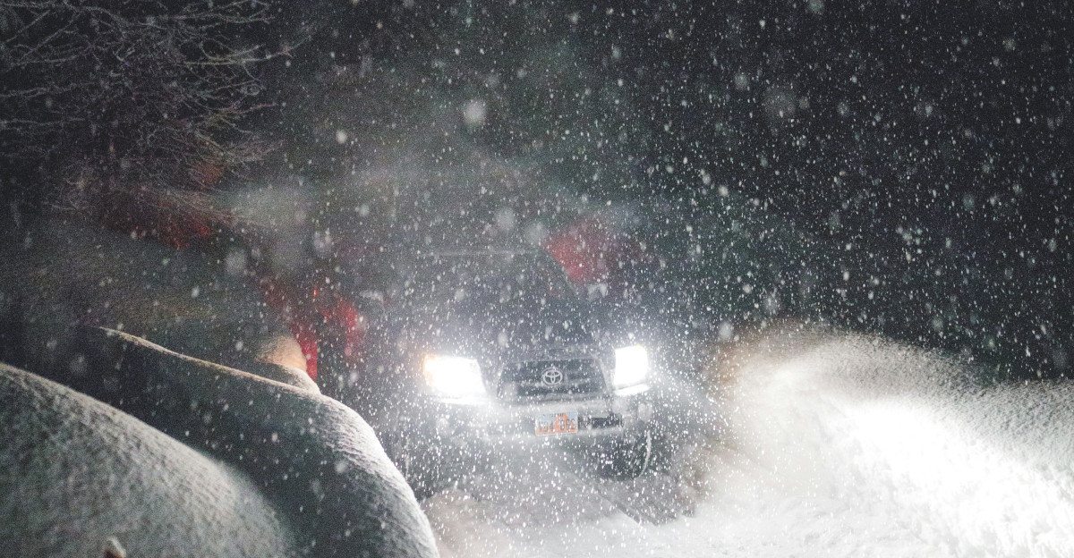 car on road during night time