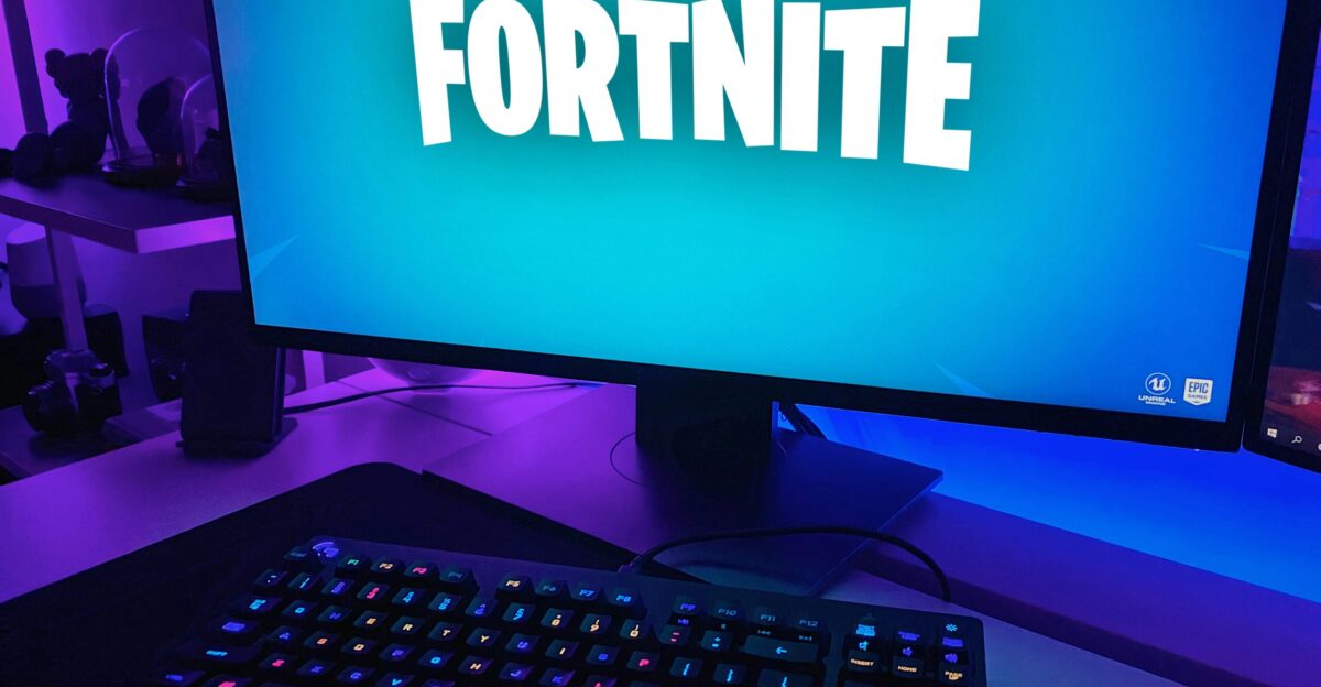 black flat screen computer monitor with black computer keyboard