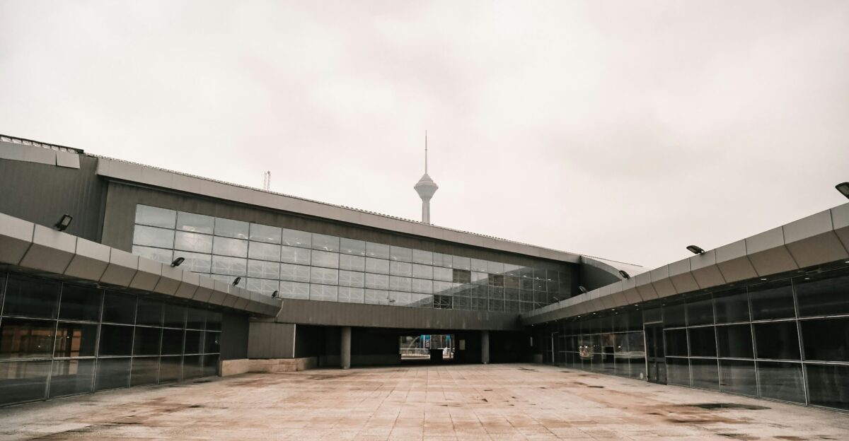 white concrete building under white sky during daytime