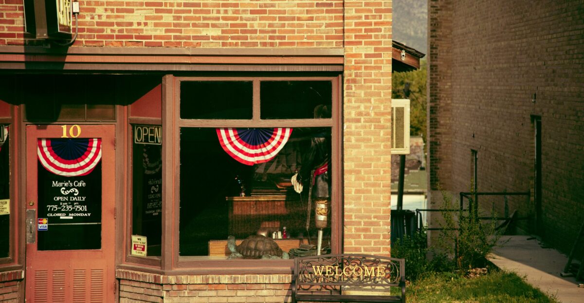 brown brick building with glass window