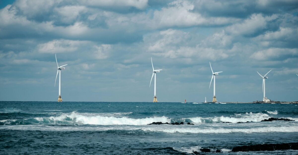 white sail boat on sea during daytime
