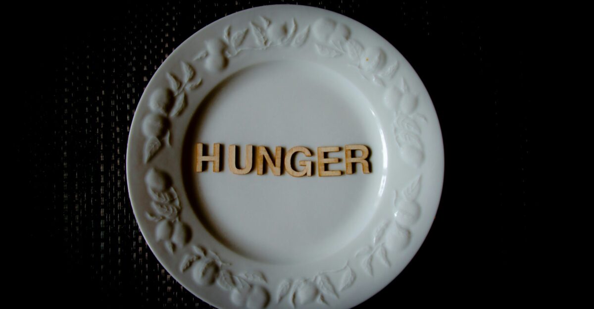 white and gold round ceramic plate