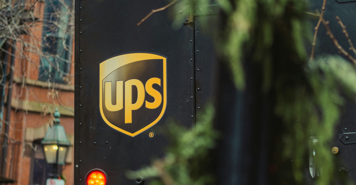 a ups bus parked on the side of the road