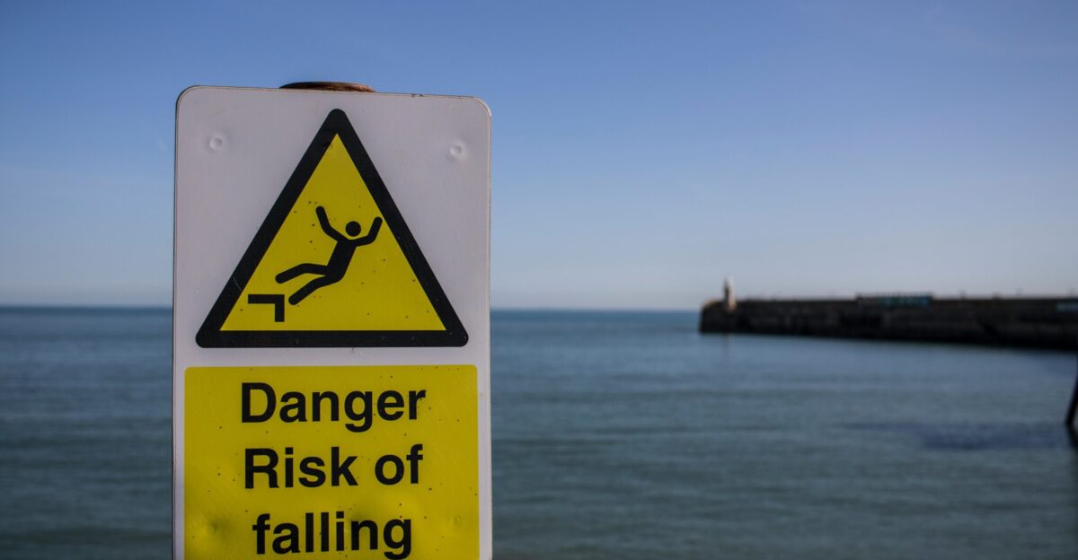 a sign warning of a danger of falling