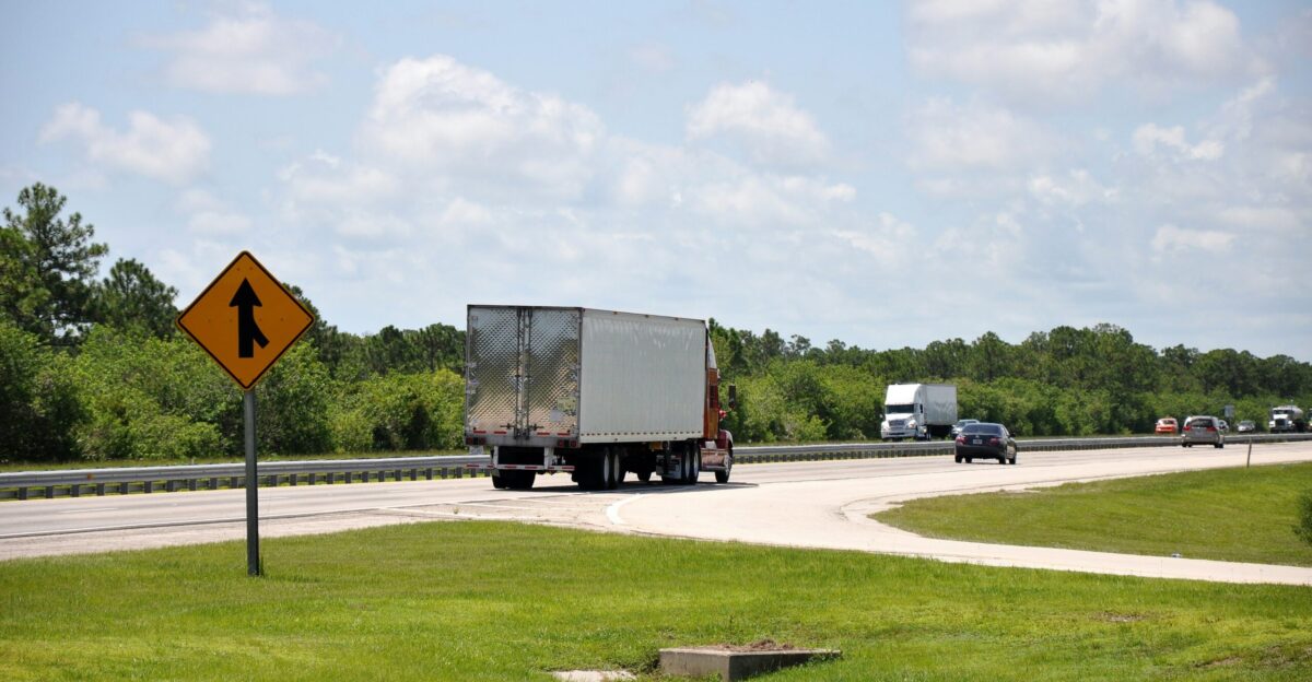 a truck driving down the road