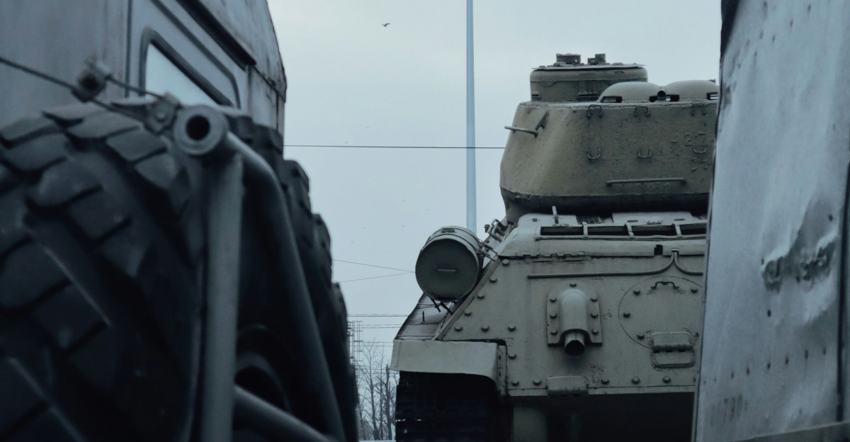a military tank with a flag on top
