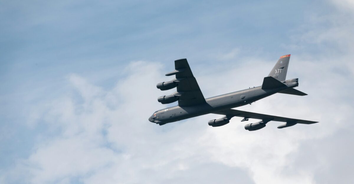 a large airplane flying in the sky