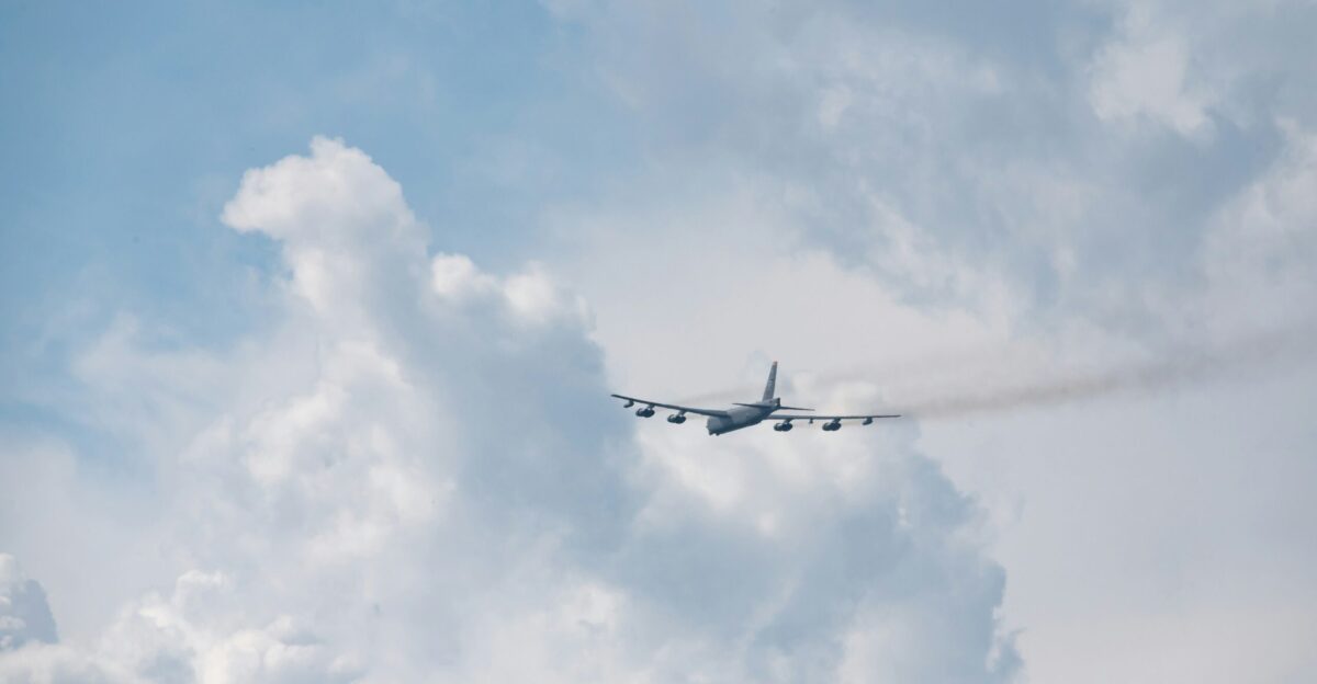 a plane flying in the sky