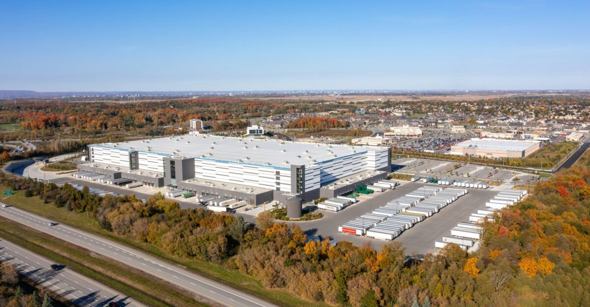 a large building with a parking lot