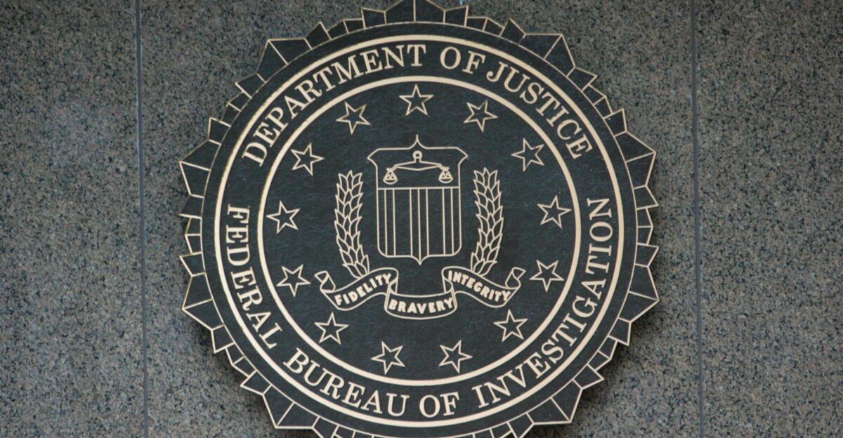 the seal of the department of justice on a wall