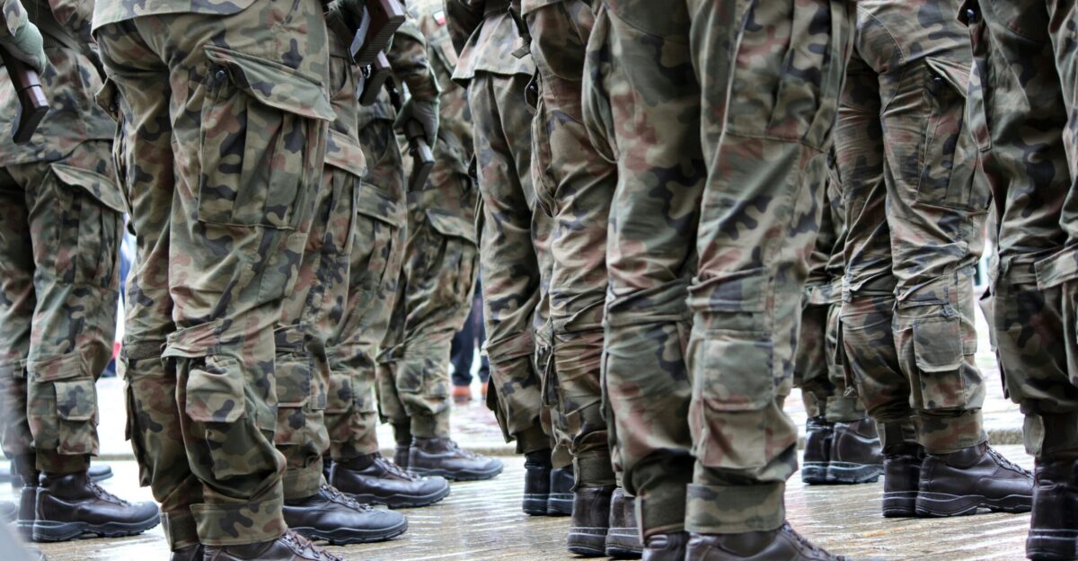 a group of military men standing next to each other