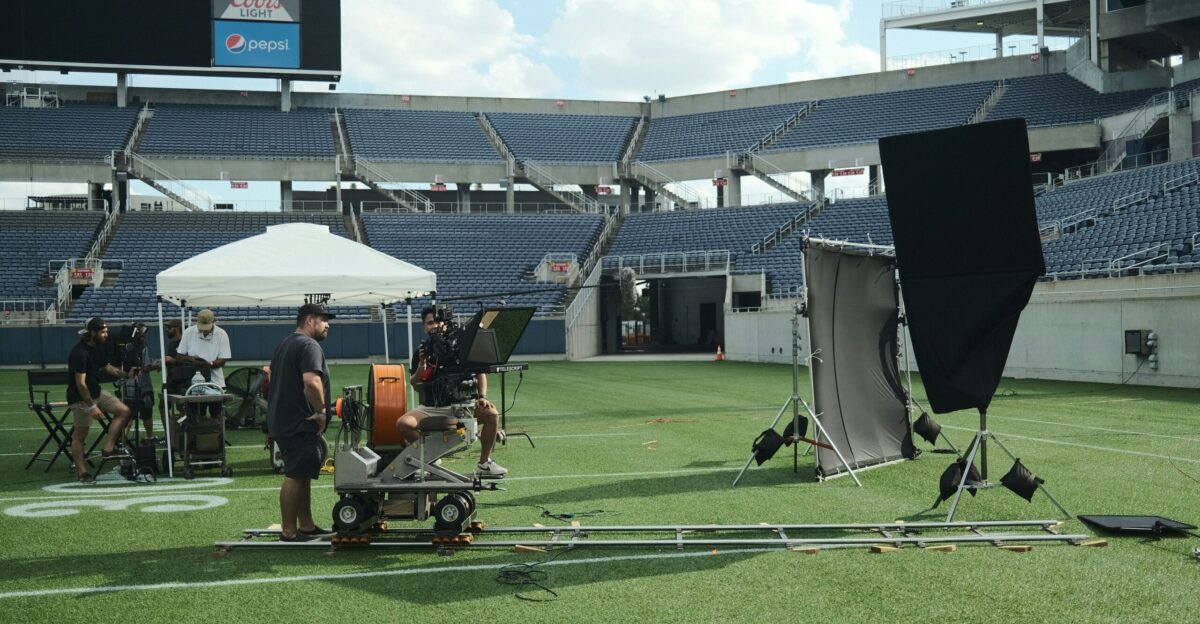 a camera set up on a football field