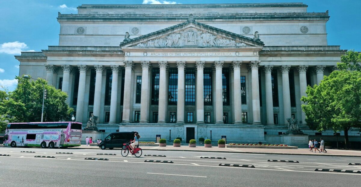 A large building with columns on the front of it
