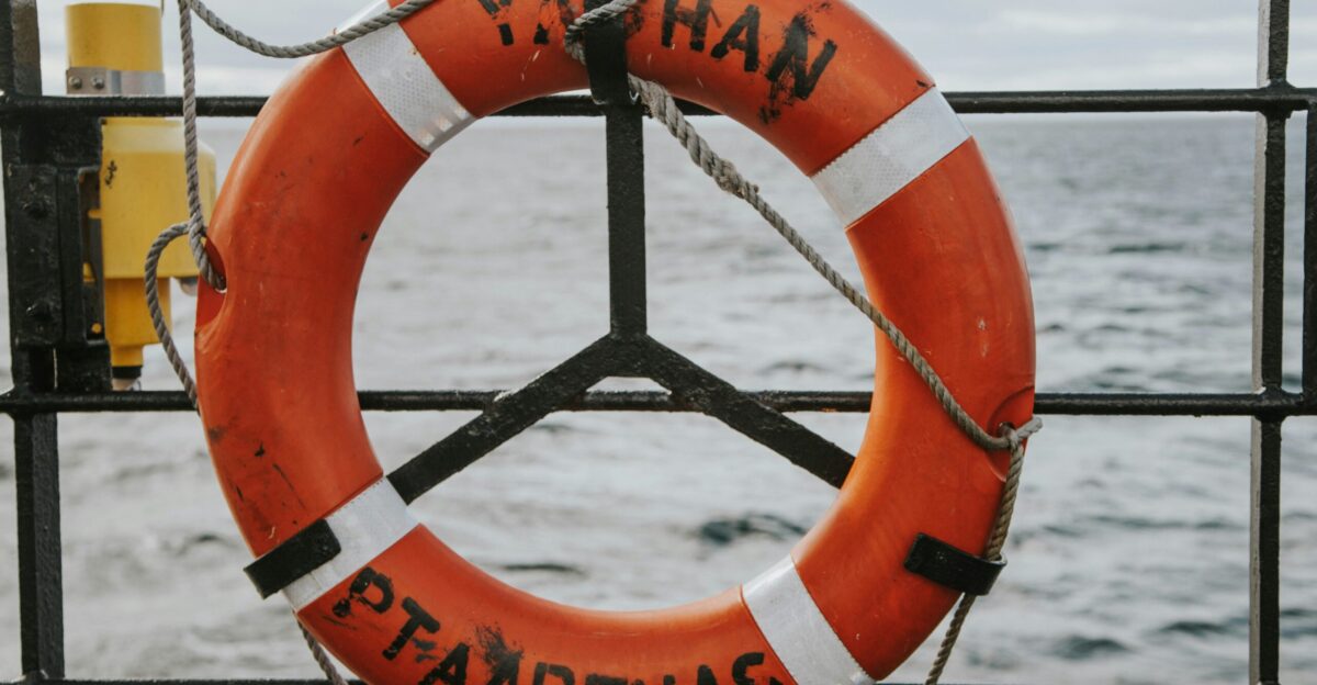 A life preserver on a boat in the water