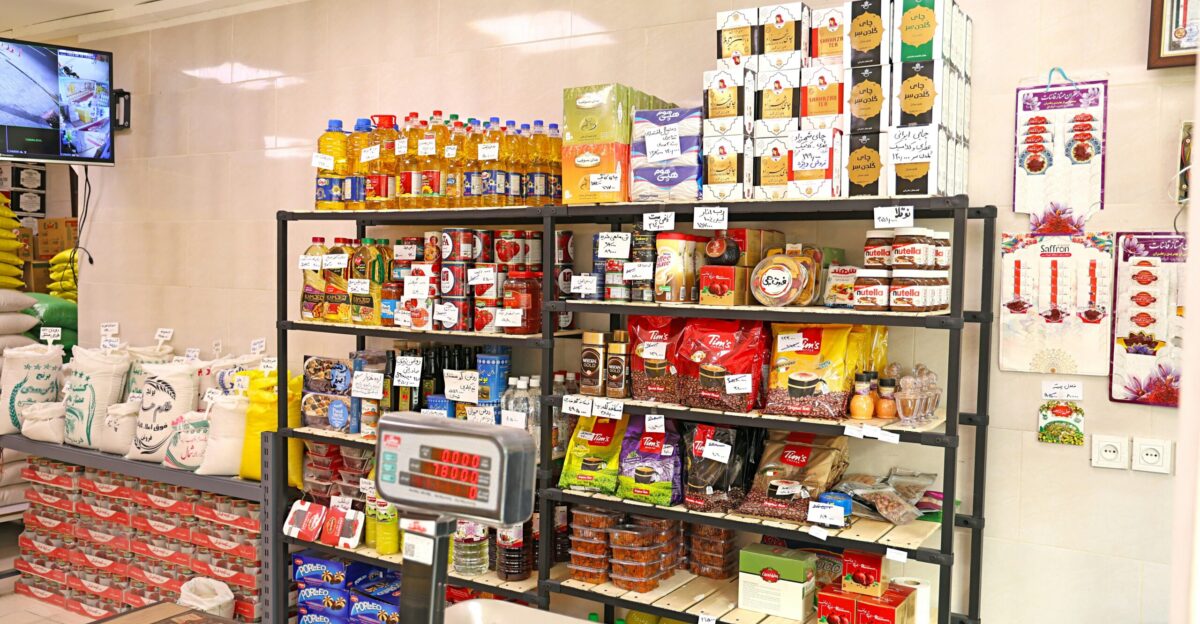 Shelves stocked with groceries in a small store