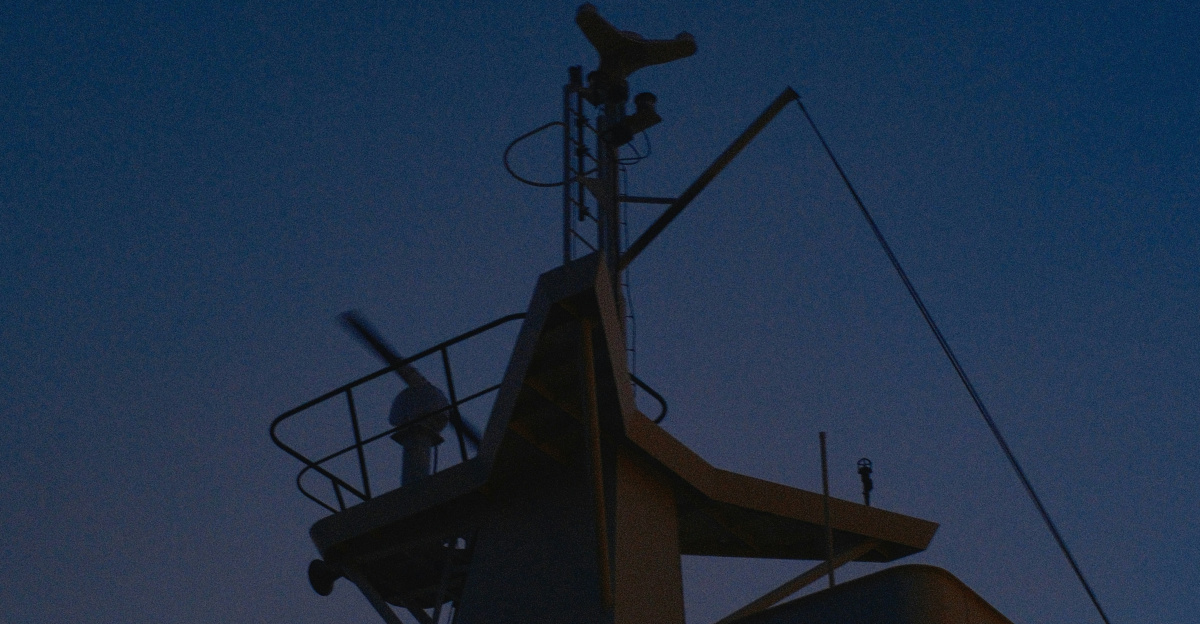 Ship's bridge against a twilight sky