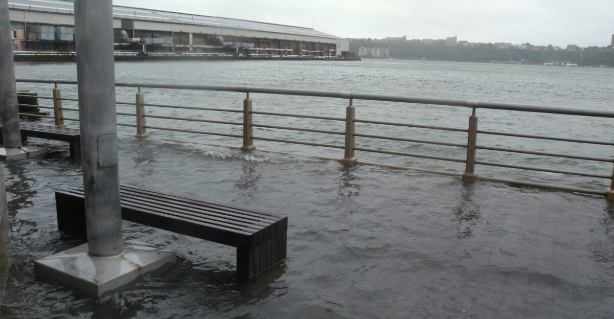 Looking west at a flooded bit of Hudson River Park before the sky cleared