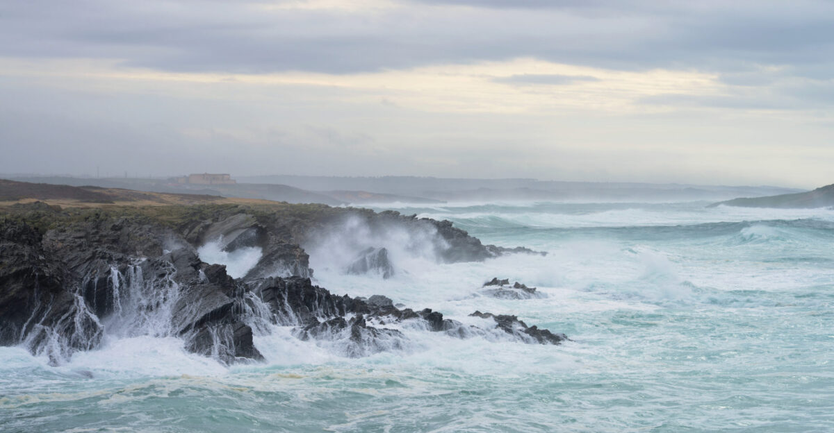 Surf and foam in a stormy sea Porto Covo Portugal