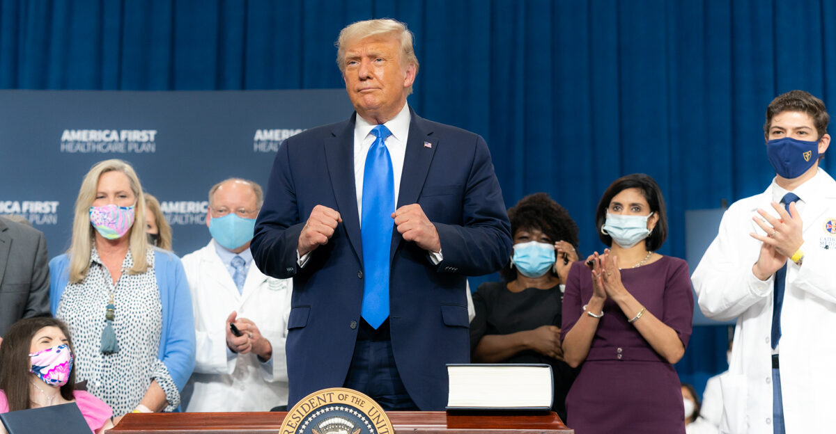 President Donald J Trump gestures with a fist-pump after signing an Executive Order protecting insurance for people with pre-existing medical conditions on Thursday Sept 24 2020 following his address on the America-First Healthcare Plan at the Duke Energy Hangar in Charlotte N C Official White House Photo by Shealah Craighead