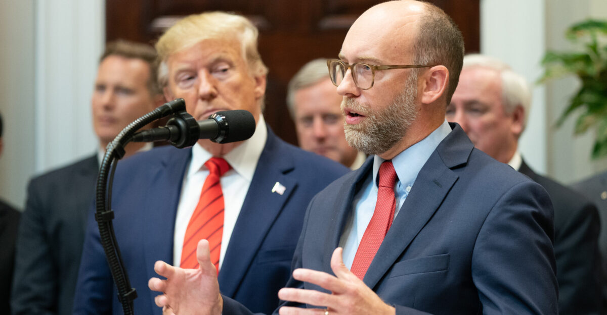 President Donald J Trump listens to the Office of Management and Budget Acting Director Russ Vought delivers remarks prior to President Trump signing Executive Orders on Transparency in Federal Guidance and Enforcement Wednesday Oct 9 2019 in the Roosevelt Room of the White House Official White House Photo by Shealah Craighead