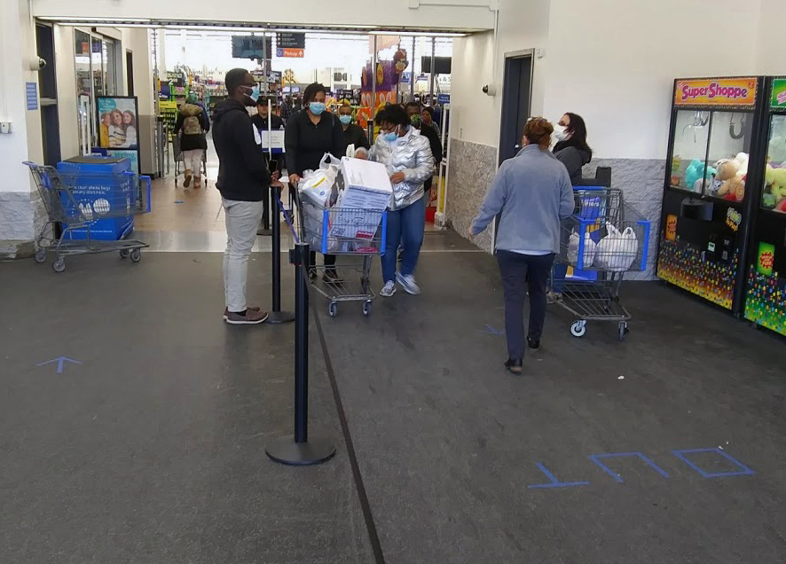 Separate entry and exit lanes at Walmart in the Town of Wallkill outside Middletown NY USA in order that customers maintain six feet of separation from each other per social distancing measures to prevent the spread of COVID-19