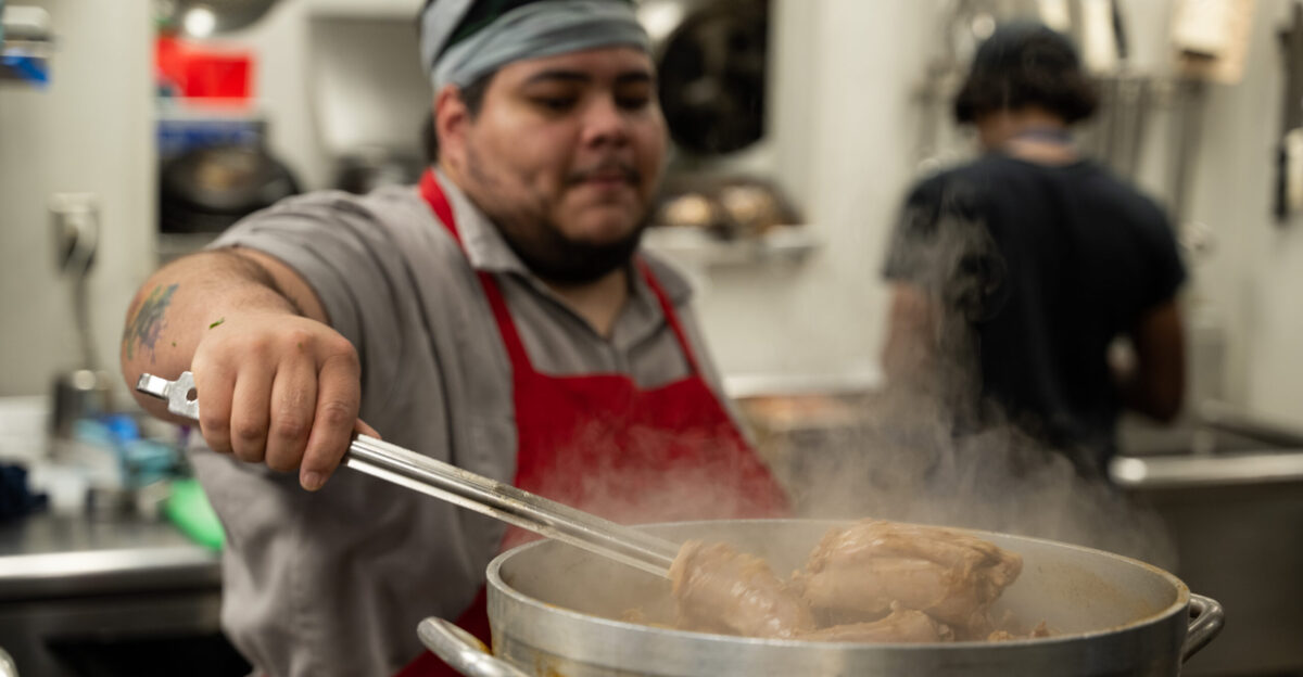 Raphael Bravo a trainer advocate for cooking baking and service with Caf Reconcile prepares some food before the restaurant opens in New Orleans La Feb 16 2023 Caf Reconcile runs a volunteer program serving self-initiated youth ages 16-24 who reside in the Greater New Orleans area Caf Reconcile combines hands-on food service training with classroom instruction individual case management job placement services and follow-up support to develop a participant s ability to become independent self-sufficient and successfully employed Featuring soul-filled local dishes Caf Reconcile is a destination lunch spot for a wide cross-section of New Orleanians as well as visitors from all across the country Focusing on the kind of soul food for which New Orleans is known the restaurant has earned high praise from local and national critics The Supplemental Nutrition Assistance Program Employment and Training initiative offers SNAP recipients in Louisiana the opportunity to gain skills training and work experience The program is funded by the U S Department of Agriculture Food and Nutrition Service and its goal is to help participants secure regular employment and achieve economic self-sufficiency USDA photo by Christophe Paul