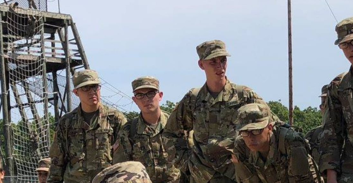 BCT recruits attempt teamwork course (Soldier back center is PV1 Clayton Marcus Weaver)