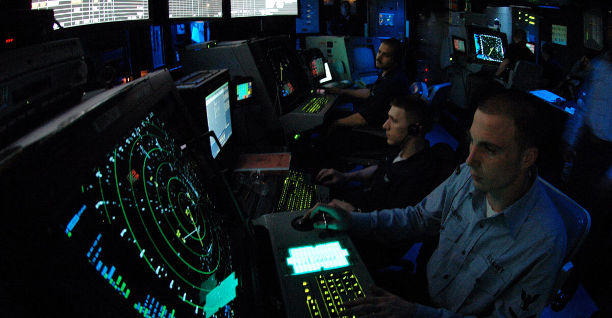 Pacific Ocean May 5 2006 - Air Traffic Controller 3rd Class David McKeehe works approach control in Carrier Air Traffic Control Center CATCC aboard the Nimitz-class aircraft carrier USS Abraham Lincoln CVN 72 Lincoln and Carrier Air Wing Two CVW-2 are currently underway in the Western Pacific operating area U S Navy photo by Photographer s Mate Airman Ronald A Dallatorre RELEASED