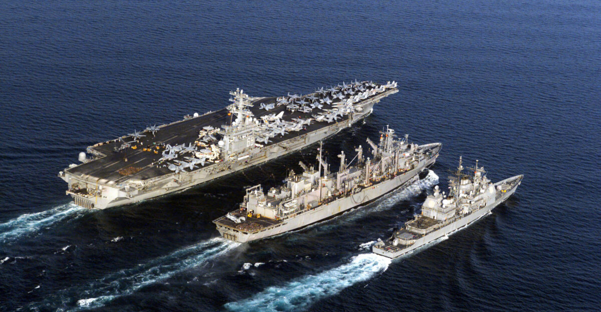 The aircraft carrier USS Nimitz CVN 68 guided missile cruiser USS Princeton CG 59 and fast combat support ship USS Bridge AOE 10 participate in an underway replenishment UNREP