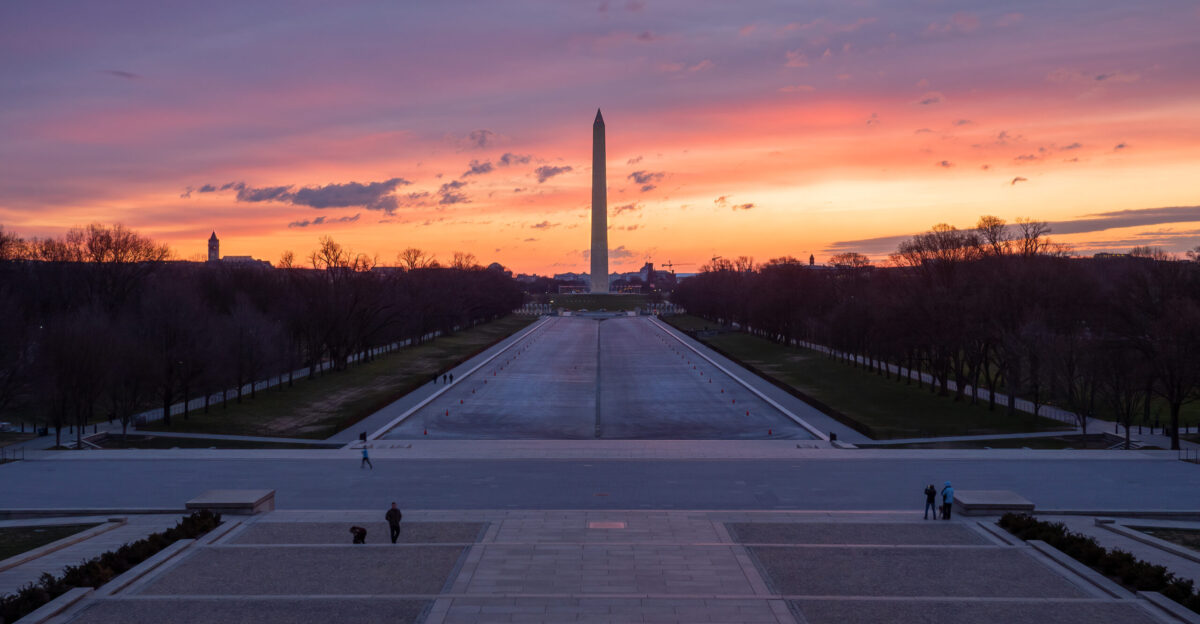 Washington Monument at sunrise seen from the Lincoln Memorial