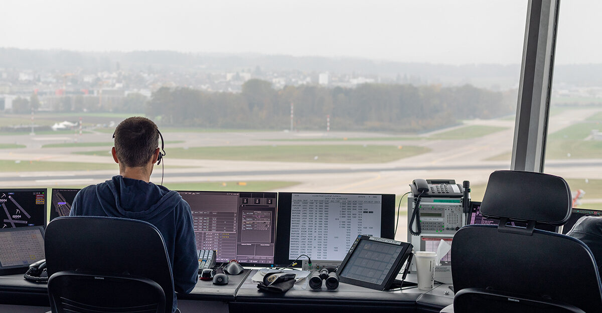A air traffic controller from Switzerland s Skyguide working in the airport tower of Zurich
