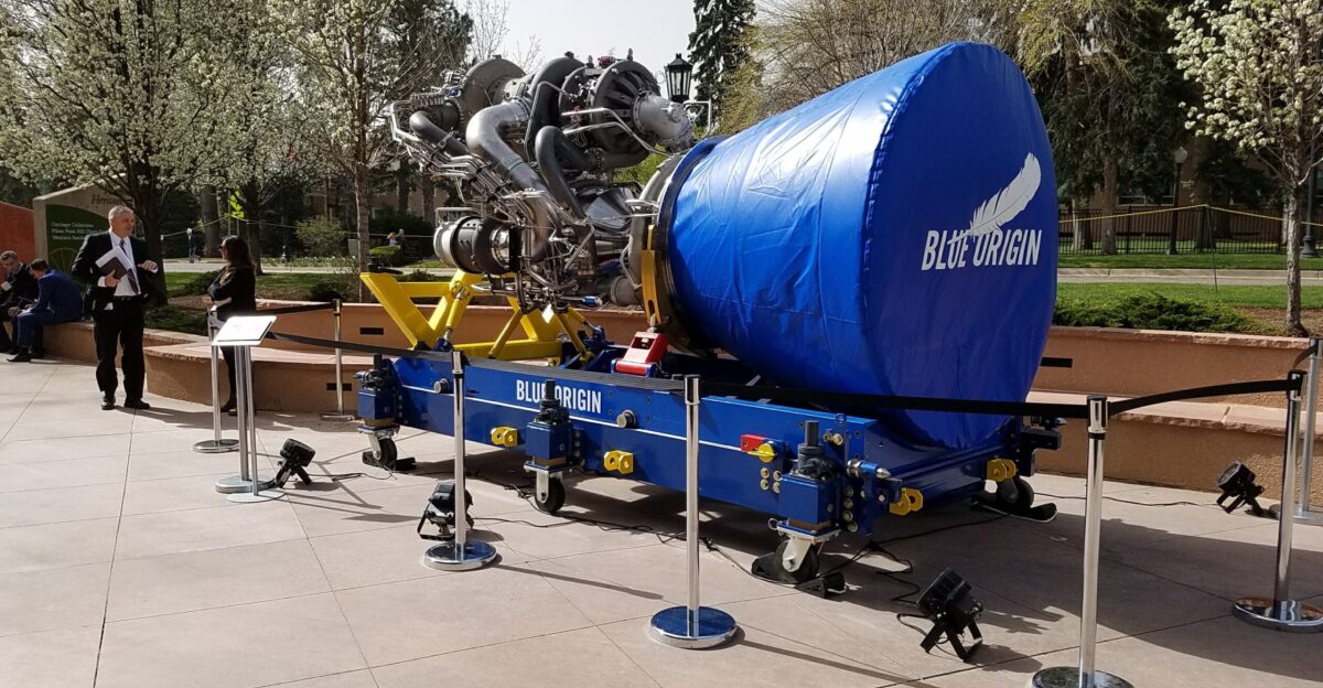 The BE-4 originally serial number 101 was manufactured in Kent Washington during October 2017 It was the first BE-4 engine to be hotfire tested on 18 Oct 2017 It has subsequently been hotfire tested disassembled rebuilt and retested several times to its current iteration in this photo noted as SN 103 Portions of this development engine have gone through destructive disassembly and inspection Part no 004-150-0000-001