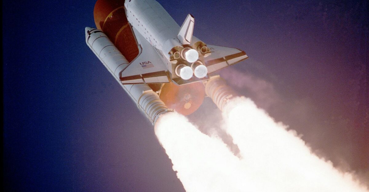 A space shuttle launches into space showcasing powerful rocket engines and USA branding