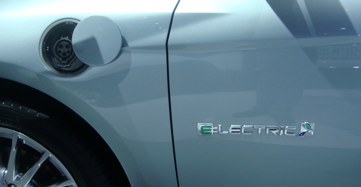 Zoom in charging port and Ford's road leaf logo for electric cars from a 2012 Ford Focus Electric exhibited at the 2011 Washington Auto Show