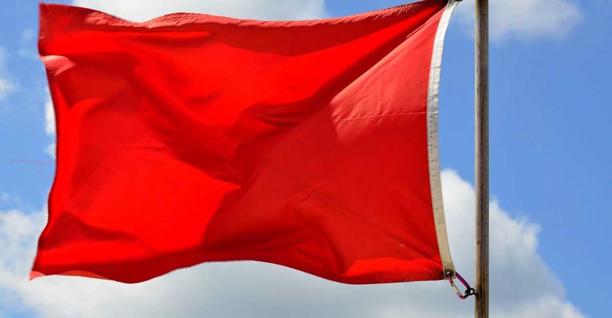red flag warning beach ocean lifeguard safety sign flag dangerous red symbol danger sea caution water sky wind hazard coast forbidden summer color coastline shore swimming weather alert nature red flag red flag red flag red flag red flag