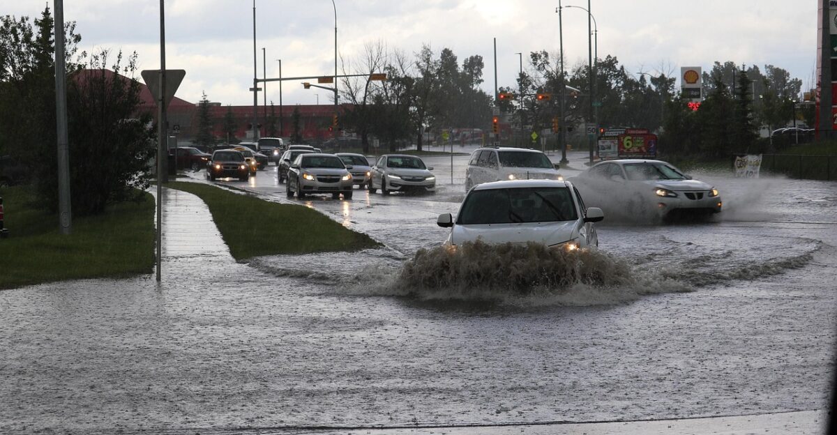 flooded road flood flooding storm rain water wet thunderstorm nature city