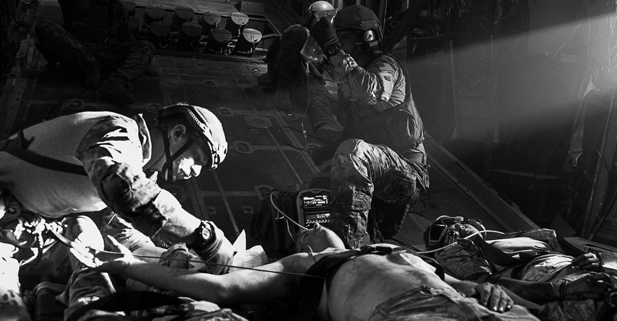u s air force, casualties, plane, treating, medics, medical, black and white, men, gray medical, gray plane, gray airplane, casualties, casualties, casualties, casualties, casualties