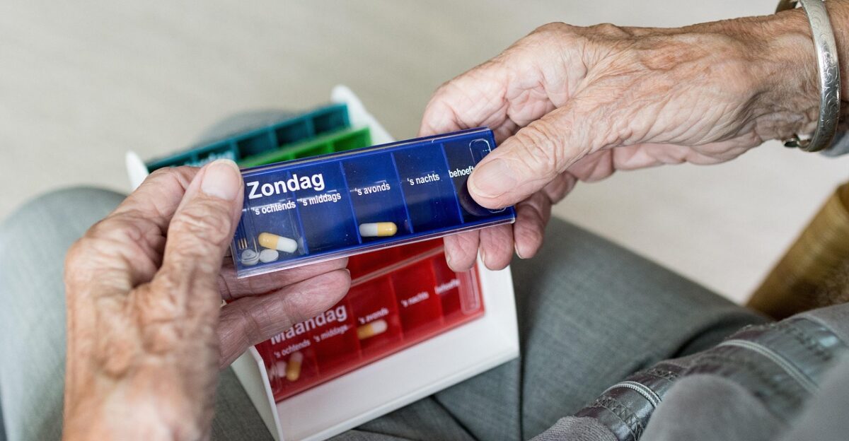 hand human woman hands elderly senior citizens self-reliance loneliness lived old woman welfare old age old grandmother seniors retirement old person vulnerable concern medicines pillbox medicijndoos medication aging