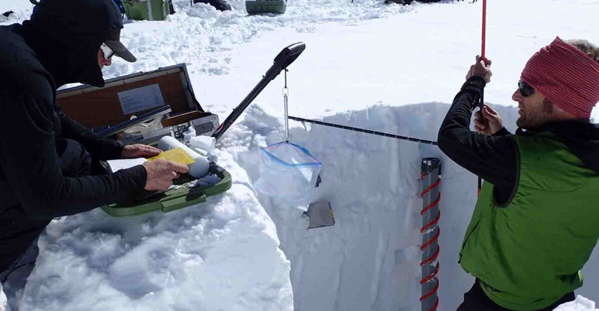 A researcher measures glacier characteristics Glacier monitoring in Denali Keywords denali glacier aknatureandscience