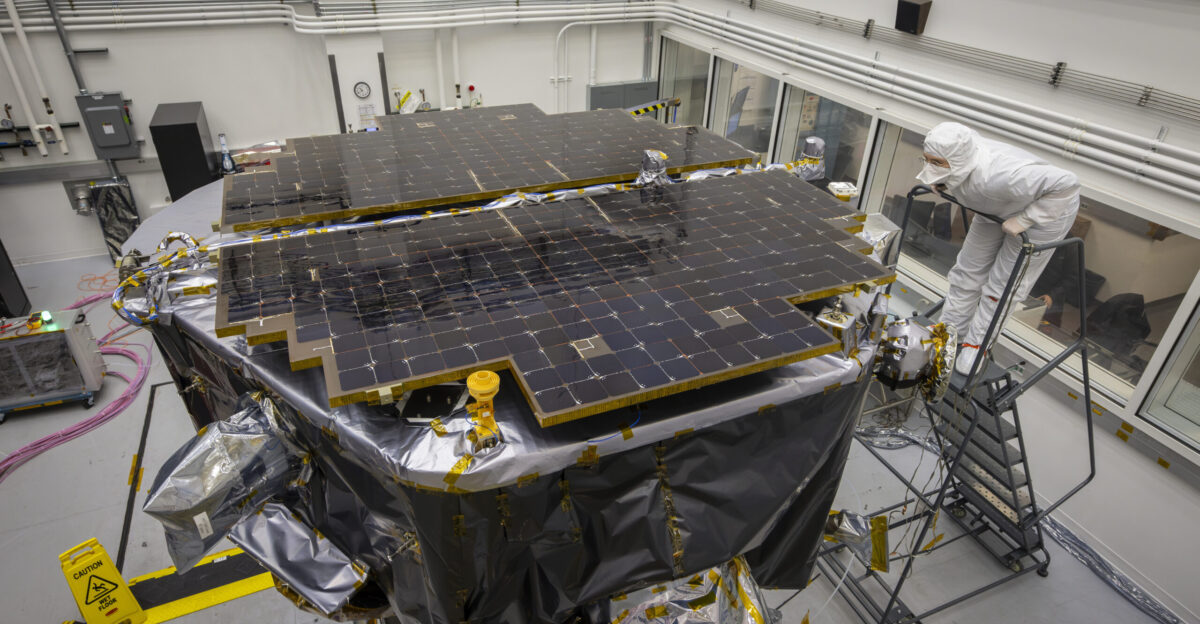 Suzie Kellogg inspects the Interstellar Mapping and Acceleration Probe on the vibration table before the start of vibration testing at the Johns Hopkins Applied Physics Laboratory in Laurel Maryland Credit NASA Johns Hopkins APL Princeton Ed Whitman