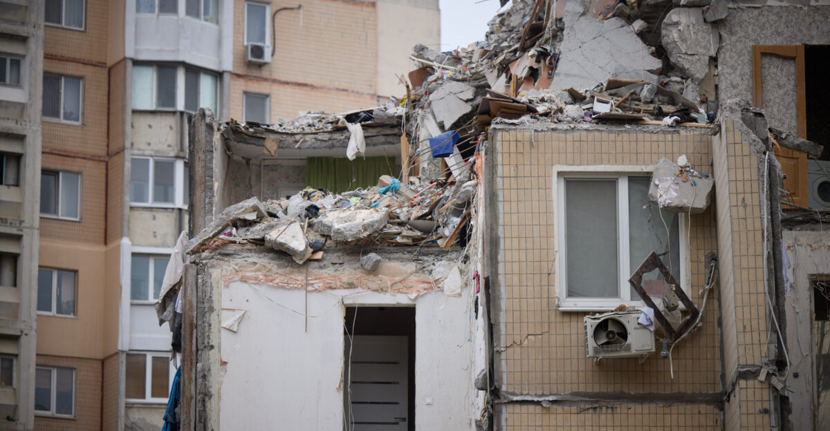 During a working trip to Odesa region President of Ukraine Volodymyr Zelenskyy and Prime Minister of Greece Kyriakos Mitsotakis honored the memory of Odesa residents killed on March 2 as a result of a Shahed UAV hitting a nine-story residential building On the night of March 2 another attack by the Russian Federation using kamikaze drones on the city of Odesa completely destroyed 18 apartments and damaged 36 apartments in a high-rise building at 134 Dobrovolskoho Avenue killing 12 people including five children Another nine people were injured The search and rescue operation was completed on March 3 with five people rescued The President of Ukraine spoke with the residents of the damaged nine-story building and neighboring houses The people told Volodymyr Zelenskyy about their experiences during the enemy attack and thanked all the services and local authorities who rescued people and are now providing the necessary assistance The Head of State expressed deep condolences to the families and friends of the victims of the Russian attack and wished a speedy recovery to the injured We understand that this is an enormous pain especially for those who have lost loved ones Volodymyr Zelenskyy said According to him all the relevant services fulfilled their duties helping and fighting for the lives of our people The President emphasized the importance of providing everything necessary for those who lost their homes As for the apartments and the loss of documents the authorities will definitely help with this Everyone will receive compensation for the destroyed housing City and central authorities will take this issue under control the Head of State noted The destroyed section cannot be restored and must be dismantled with further fortification of the supporting structures of the rest of the building The owners of 12 destroyed apartments have applied for compensation under the eRecovery program and six are in the process of applying and collecting documents