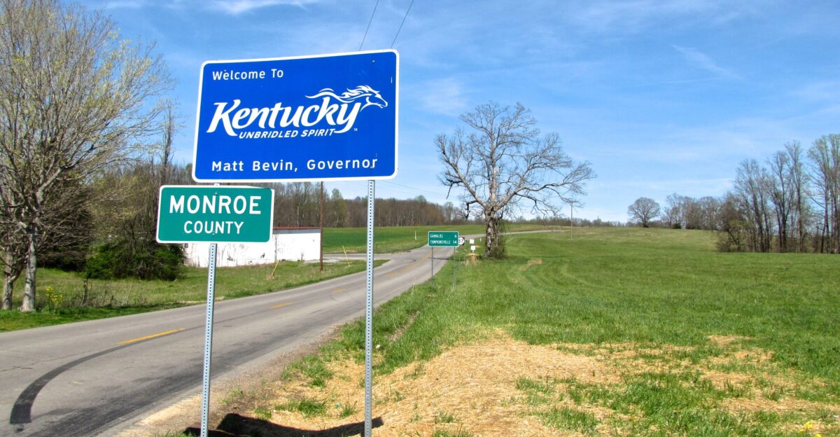 Welcome sign along Kentucky Route 87 at the Kentucky-Tennessee state line in the Bugtussle community of Monroe County Kentucky United States