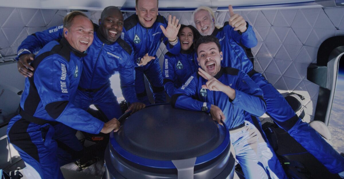 Photo taken on the day of the launch of flight NS-21 inside its capsule together with the mission team