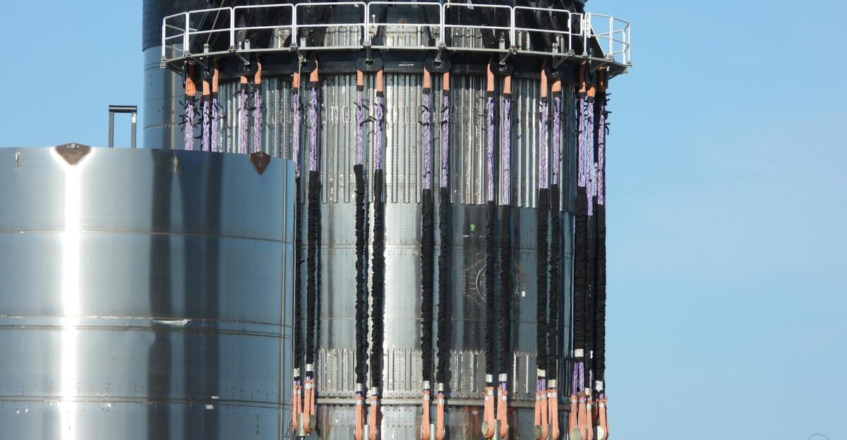 Close-up of a steel structure at SpaceX Starbase in Brownsville Texas under a clear blue sky