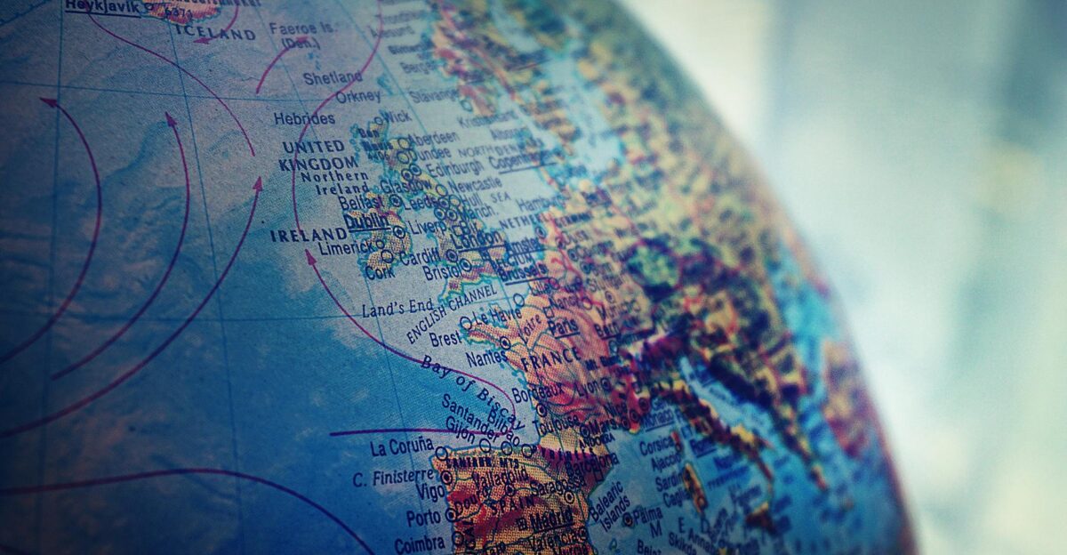 Detailed close-up of a globe showing parts of Europe and the Atlantic Ocean