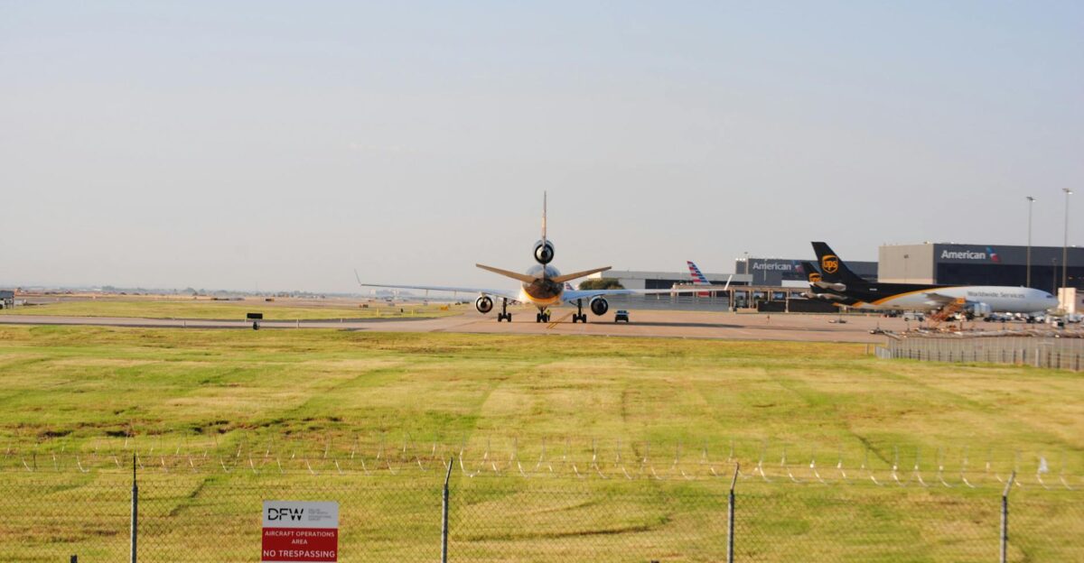 A wide view of planes taxiing at DFW Airport in Grapevine Texas Perfect for aviation and travel themes